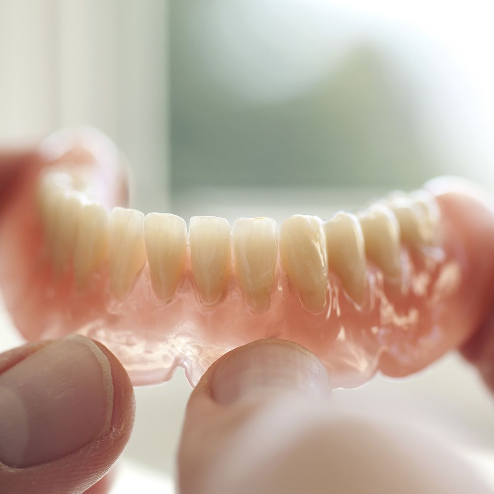 Close up of traditional dentures 